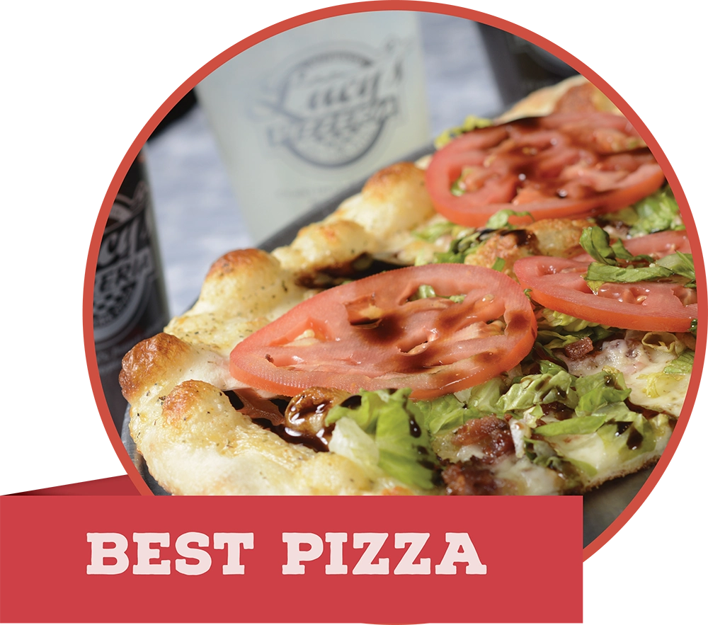 A thin-crust pizza topped with fresh lettuce, tomatoes, and balsamic glaze, with a red banner reading "BEST PIZZA."