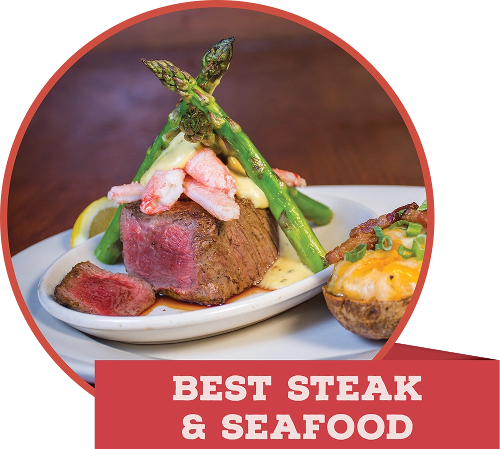A thick steak fillet topped with crab meat and asparagus next to a baked potato, with a banner reading "BEST STEAK & SEAFOOD."
