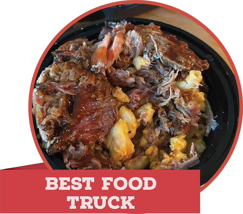 A bowl of pulled pork with barbecue sauce layered over macaroni and cheese, with a red banner reading "BEST FOOD TRUCK."