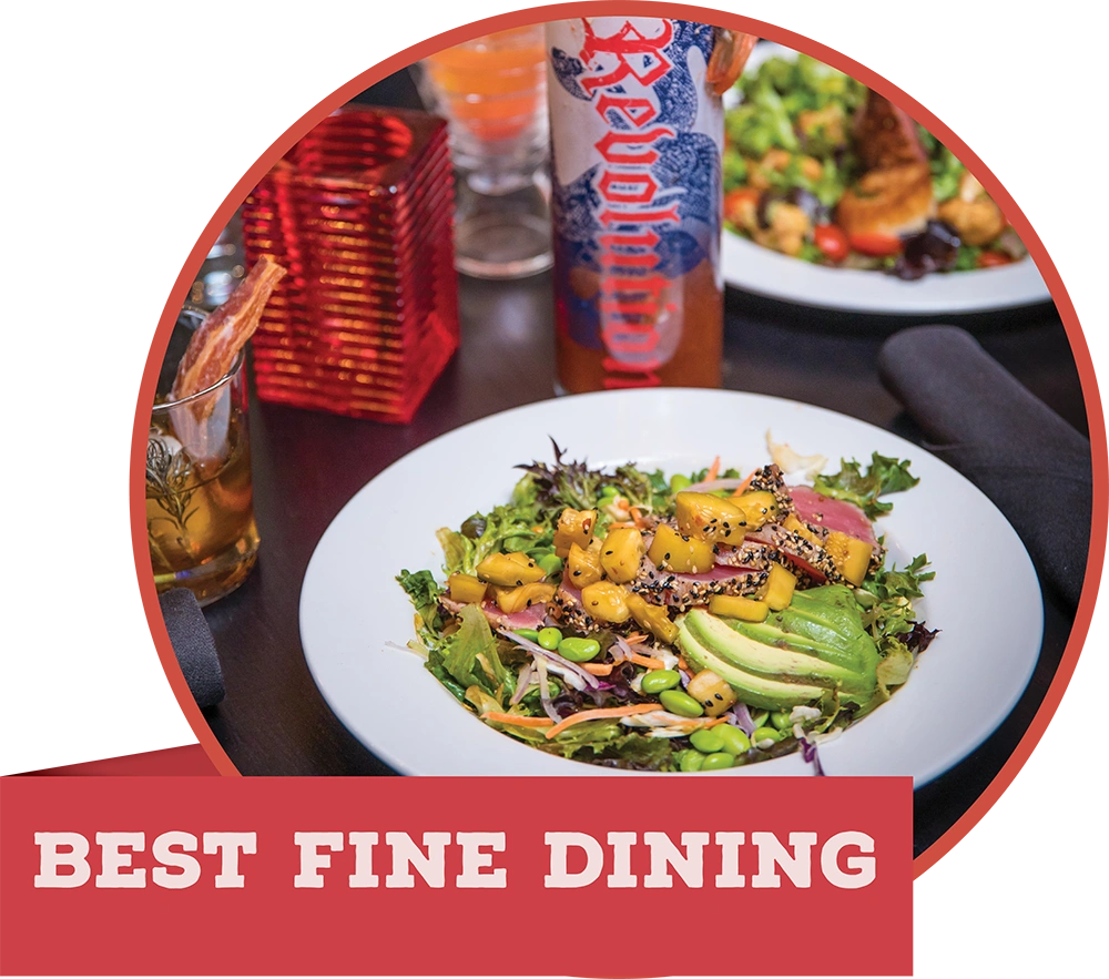 A gourmet seared ahi tuna salad topped with avocado and edamame, featuring a red banner that reads "BEST FINE DINING."